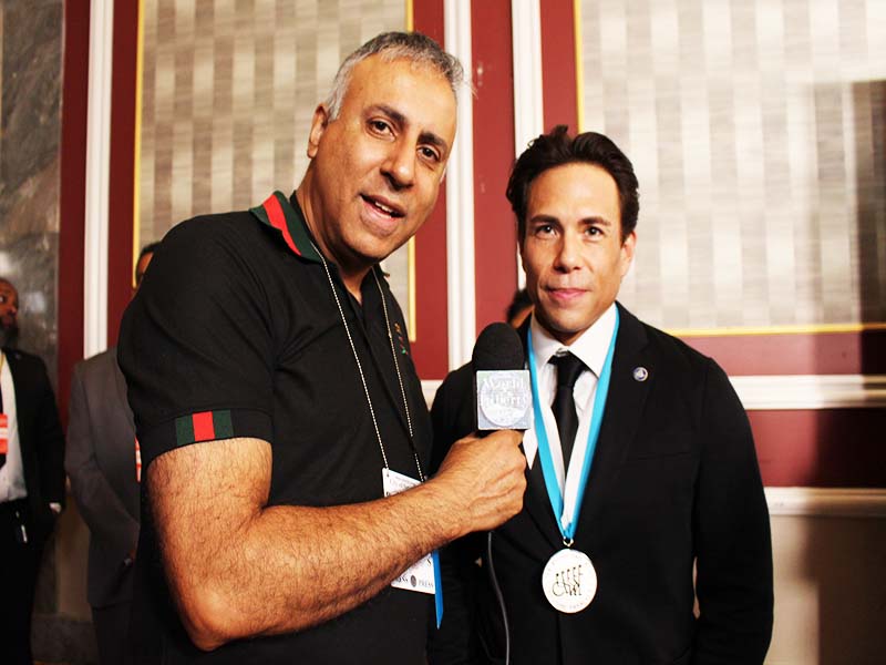 Dr Abbey with Apolo Ohno short track speed skating Champ