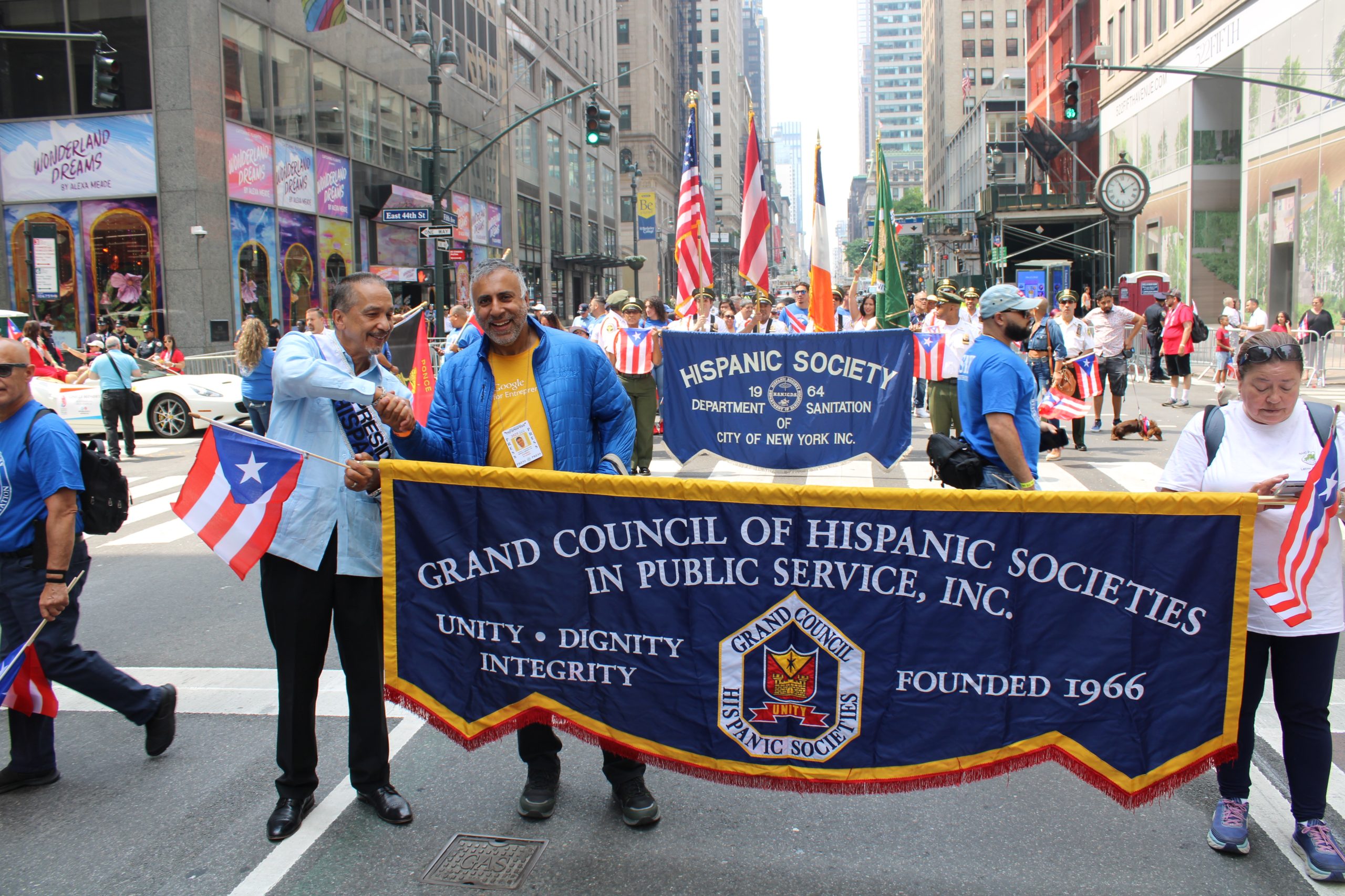 Dr Adal marching with Danny Camancho of Grand Council of Hispanic Societies in Public SVC Inc