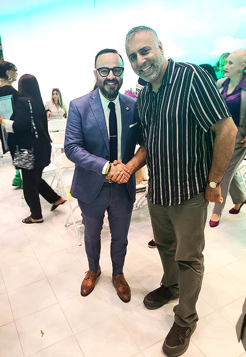 Dr Adal with Council member Francisco Moya
