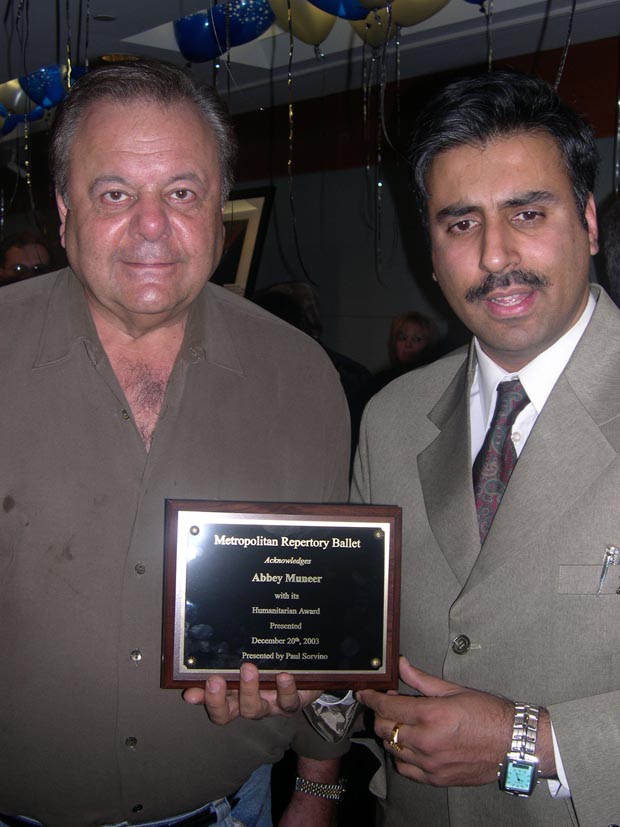Dr. Abbey recieving Award from Paul Sorvino at Lincoln Center 12 22 03