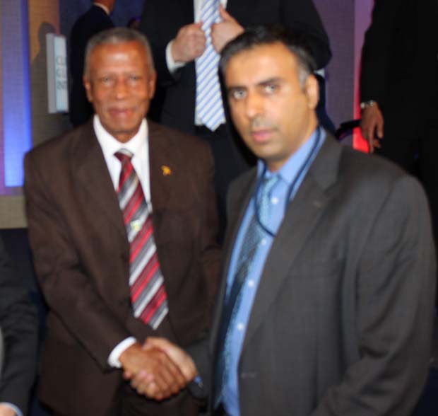 Dr.Abbey with Prime Minister Tillman Thomas of Grenada